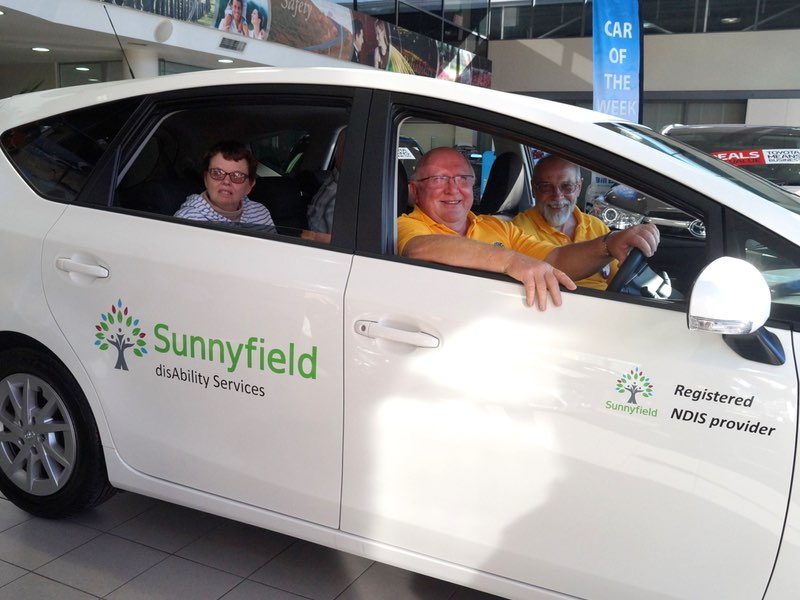 Lions Club members donate car to Sunnyfield