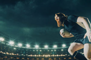 A Man Playing Rugby