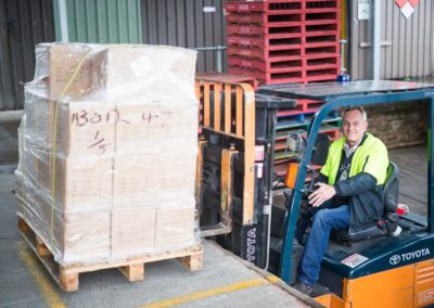 Sunnyfield-enterprises-crew-member-operating-forklift