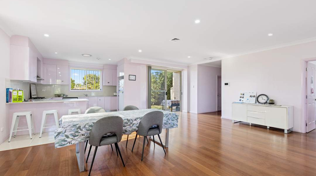 Open living- Kitchen - dining room - Access to backyard - Hallway to rooms and bathroom