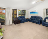 Living room - Couches - Windows all over walls - Air Conditioning