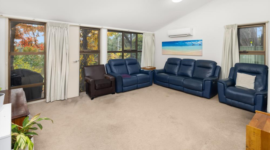 Living room - Couches - Windows all over walls - Air Conditioning